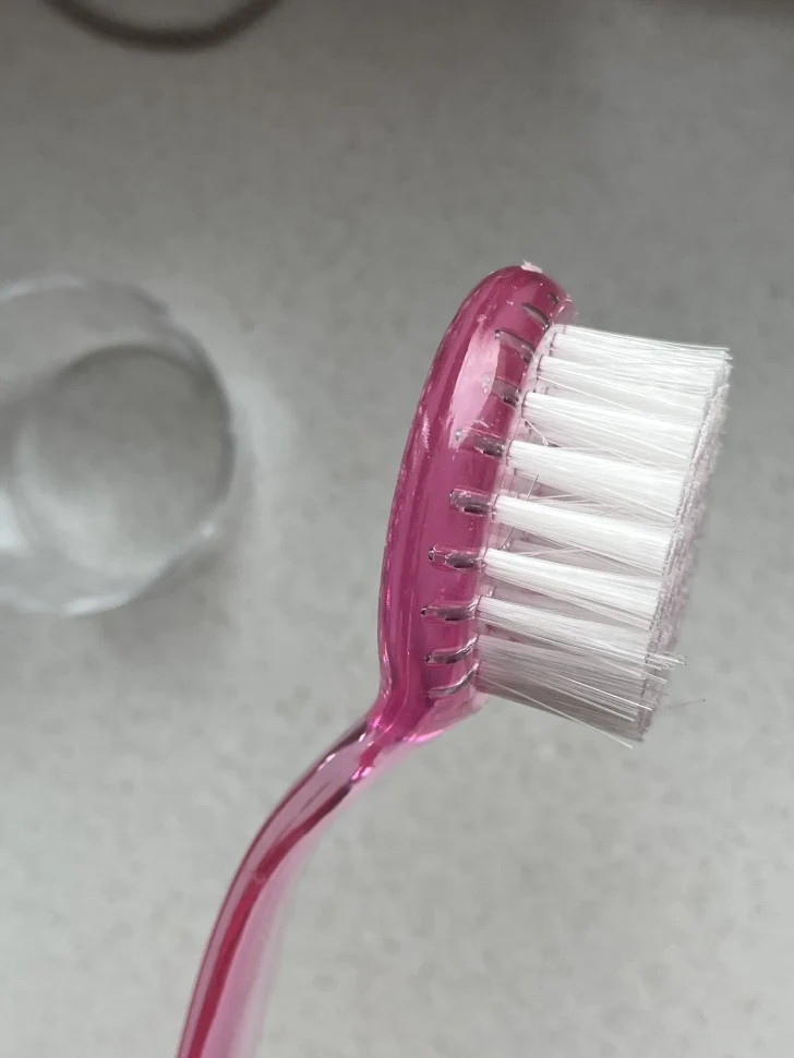 Ergonomische Staubbürste rund rosa