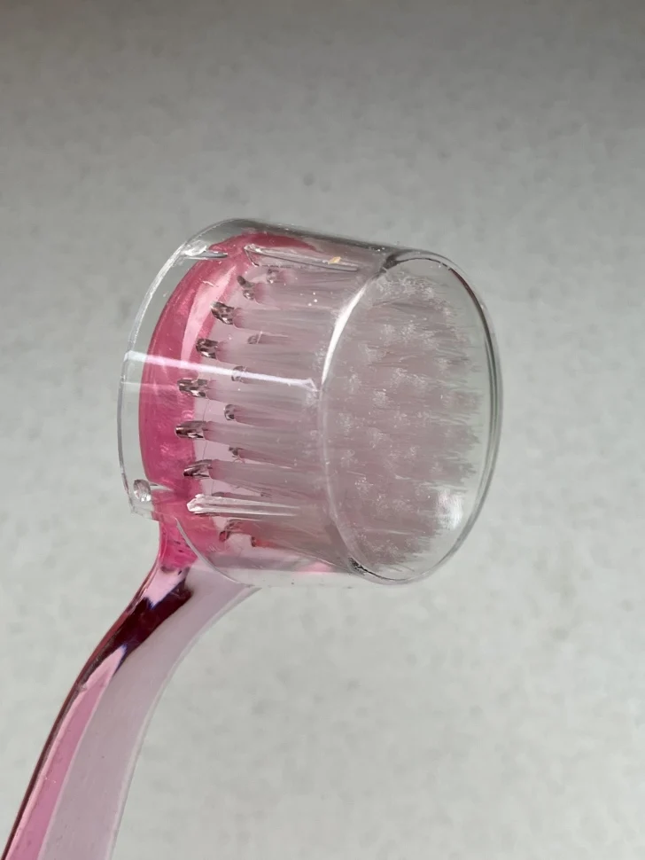 Ergonomische Staubbürste rund rosa